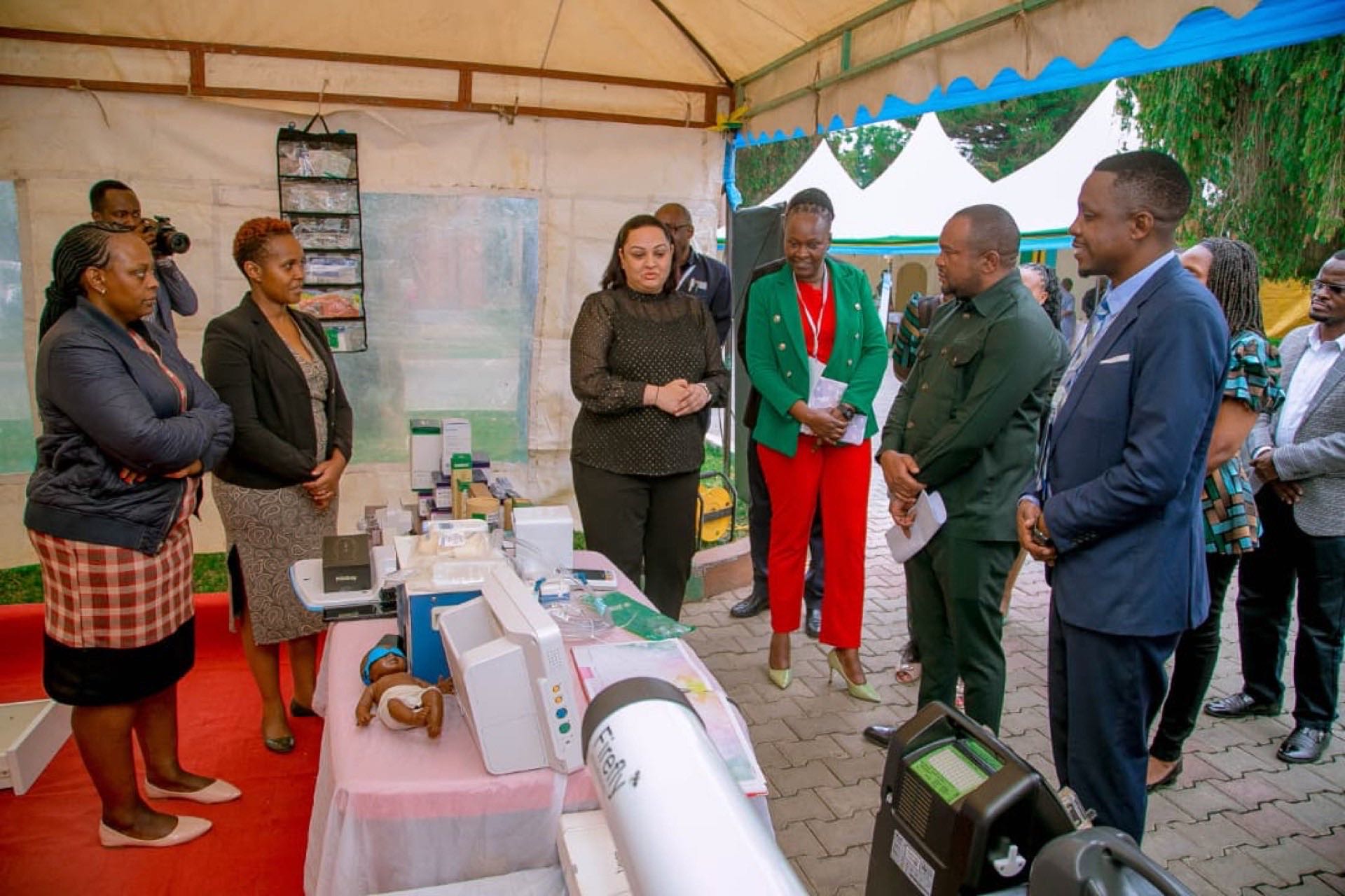 Ministry officials and clinicians at exhibition booth